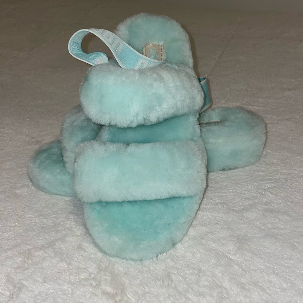 Baby blue Ugg slippers. Never worn! US size 7.